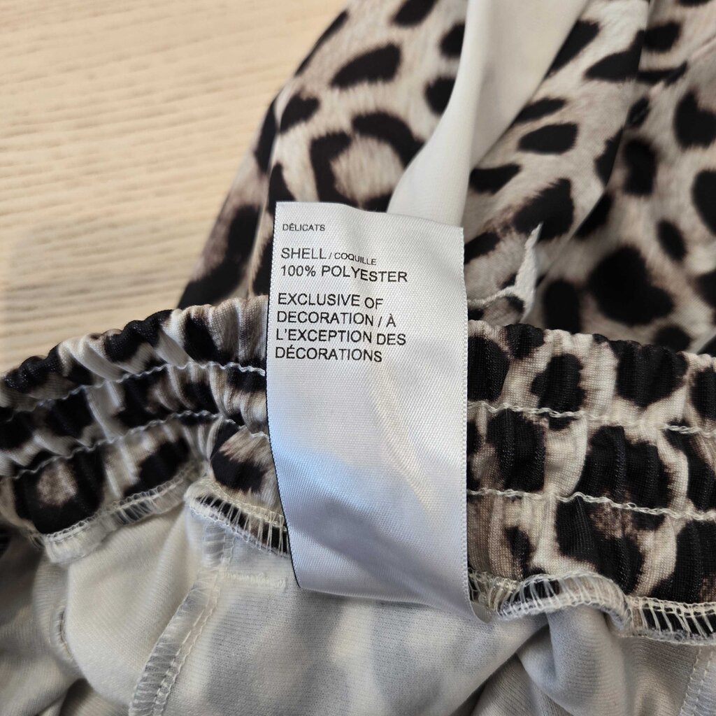 PUMA ANIMAL PRINT SZ MEDIUM B