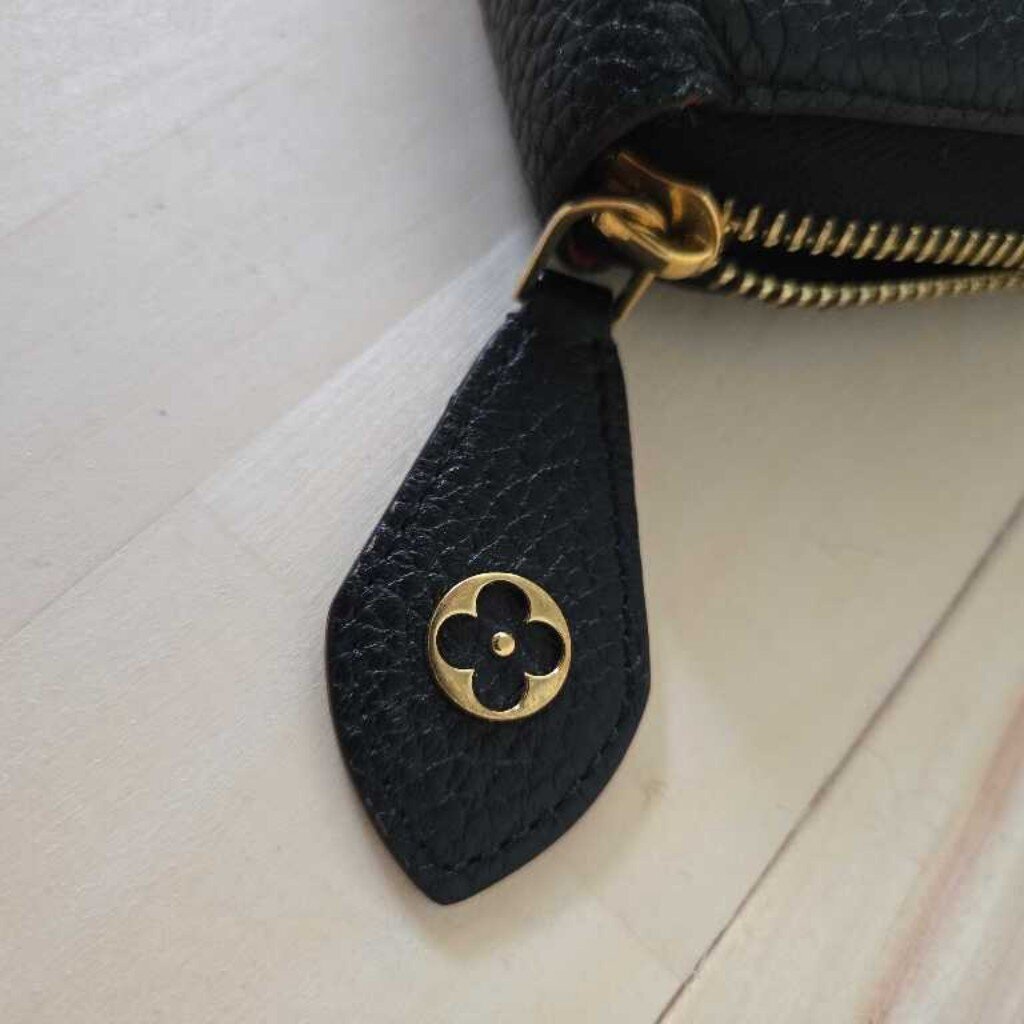 LOUIS VUITTON TAURILLON COMETE WALLET