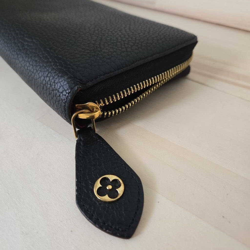 LOUIS VUITTON TAURILLON COMETE WALLET