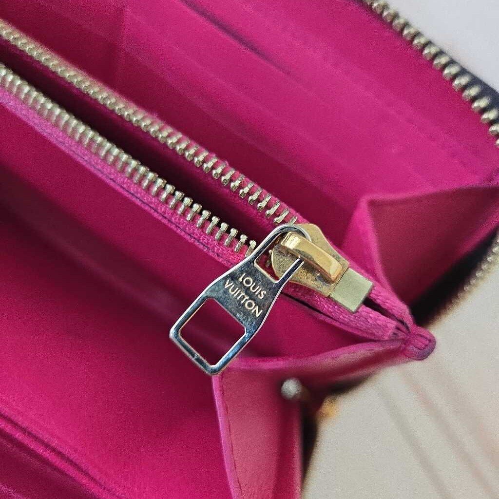 LOUIS VUITTON TAURILLON COMETE WALLET